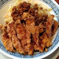 「汁なし拝骨担々麺 1,150円」@希須林 赤坂店の写真