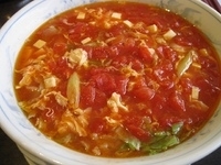 「たっぷりトマト入り刀削麺780円（クーポンにてデザート無料）」@中国名菜 吉鳳園 柏本店の写真