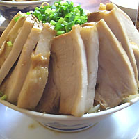 「みそ麺（少し辛めver）+大盛り+大バカバカブタ+ヤサイマシマシ」@明心角ふじの写真