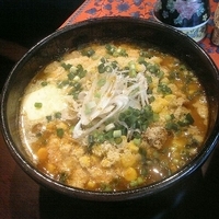 「俺流味噌ミルクトマトカレーラーメン（中辛）+粉チーズ+バター」@Ben-Bellaの写真