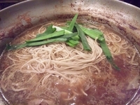 「もつ鍋の〆のラーメン」@博多屋台上がり からくさやの写真