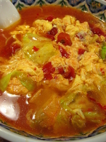 「トマ玉ラーメン￥780」@中国ラーメン 揚州商人 東池袋店の写真