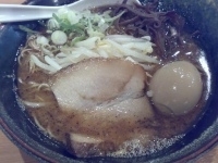 「黒ラーメン 玉子」@元祖伝説のマー油・熊本黒らーめん 好来 ラーメン甲子園店の写真