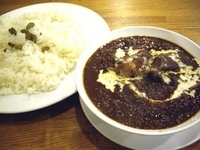 「フィッシュカレー（マイルド）+ベーコン追加+ライス（中）」@カーナ・ピーナの写真