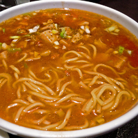 「麻婆麺 ￥780（麻婆麺+水餃子+漬物+杏仁豆腐+半チャーハンセ」@吉龍軒の写真