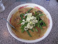 「カレーもつ煮込みらぁーめん：８５０円」@麺酒場 丸勝の写真