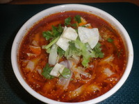 「酸辣麺（６５０円）大盛（１００円）サービス券（－１００円）」@串八珍の刀削麺 両国店の写真