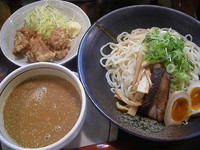 「ごま味噌つけ麺+半熟味付け玉子+とりからと生キャベツ+豚ほぐし丼」@希望軒 新宿三丁目店の写真
