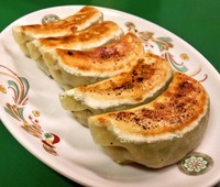 「ラーメン＋餃子(500円＋350円)」@新華楼の写真