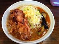 「ピリ辛あんかけ拉麺 780 ＋ プチ唐揚げ 150」@旨辛ラーメン 表裏の写真