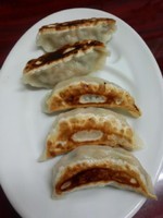 「北京焼餃子240円（水曜日は餃子半額デー）」@中国料理 北京餃子房の写真