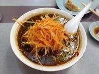 「たいわんラーメン　トッピング辛味ネギ別皿ニンニク」@くるまやラーメン 茨城協和店の写真