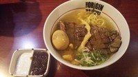 「ステーキのせ牛塩ラーメン+味玉クーポン」@らあめんHAJIMEの写真