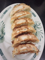 「餃子210円」@日高屋 神田南口店の写真