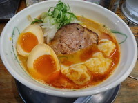 「エビ辛パンチ1100円クーポンで味玉」@流星軒の写真