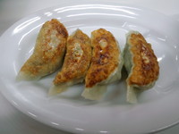 「本日のランチ タンメン+餃子+半チャーハン=750円」@精龍軒の写真