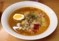 「トマトカレーチーズラーメン(ライス付)1,090円」@魔女のカレーの写真