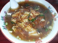 「入口ラーメン(辛口)700円」@入口の写真