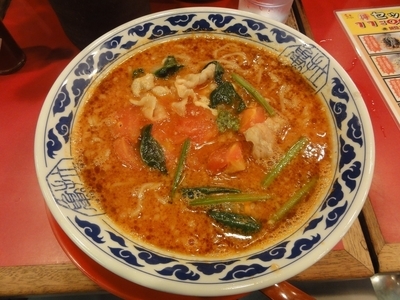 「トマトらーめん」@九州らーめん 亀王 西中島店の写真