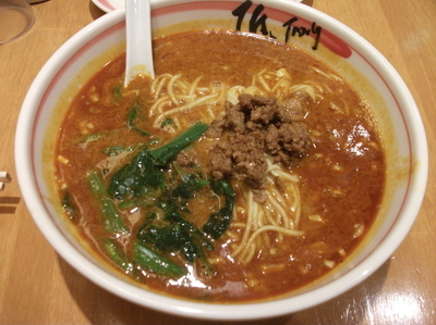 「麻辣担担麺+スパイシー手羽先揚げ」@匠Jang 横浜ポルタ店の写真
