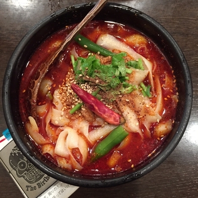 「麻辣刀削麺ハーフ」@刀削麺 張家 品川店の写真