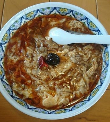 「激辛スーラータンメン【刀切麺】」@中国ラーメン 揚州商人 第二産業南中野店の写真