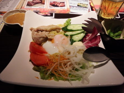 「温玉ラーメンサラダ」@居酒屋 山の猿 千歳店の写真