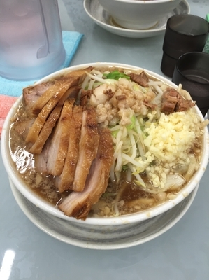 「ラーメン豚入り」@ラーメン 富次郎 堀町店の写真