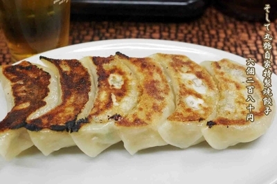 「自家特製焼餃子　6個280円」@丸鶴の写真