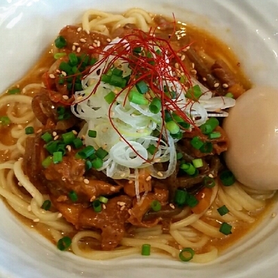 「【新メニュー】ピリ辛モツまぜそば　７５０円＋味玉」@まぜそば 一心不乱の写真