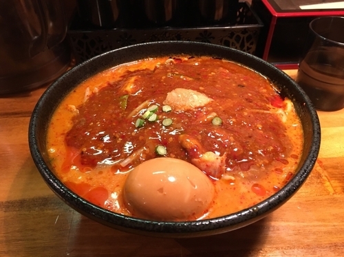 「味玉どて辛めん 辛さ普通 ニンニク少なめ 脂少なめ」@どてちん 習志野店の写真