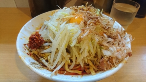 「辛麺(ホアジャオ・辛味玉)＋汁無し・豚増し」@豚星。の写真