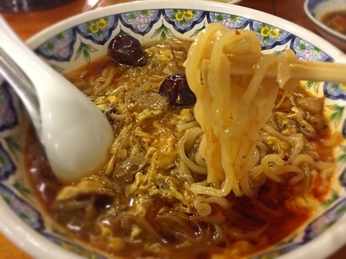 「激辛酸辣湯麺」@中国ラーメン 揚州商人 港北店の写真