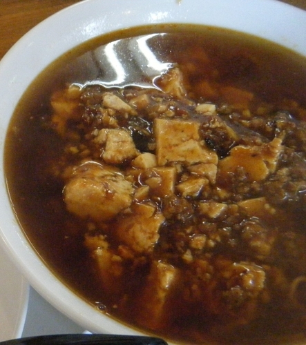 「ﾏｰﾎﾞらーめん(ﾊｰﾌ)530円」@麺飯家 龍門の写真