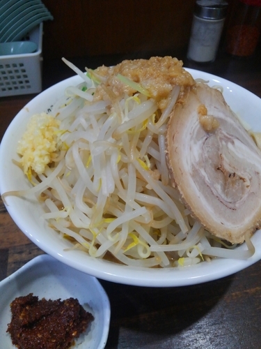 「爆麺(750円)+自家製練り唐辛子(100円)」@骨豚亭の写真