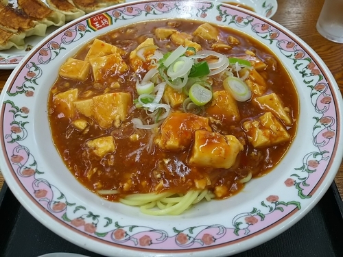 「【限定】麻婆麺　＋餃子：サービス券」@餃子の王将 松本島内店の写真