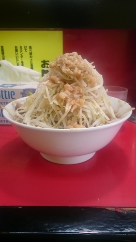 「豚ラーメン 生卵」@豚ラーメン 蕨店の写真