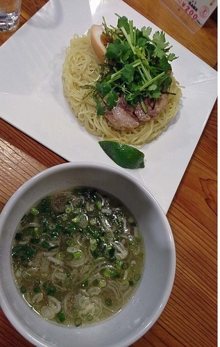 「SNS限定『辛い塩つけ麺(￥1000)』のパクチー入り」@いぶし銀の写真