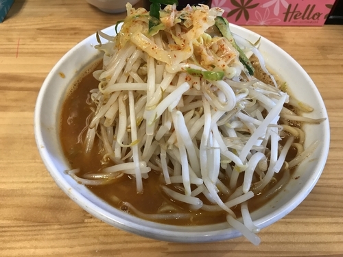 「鷹の爪拉麺旨辛スープ」@旨辛ラーメン 表裏 市ヶ谷本店の写真