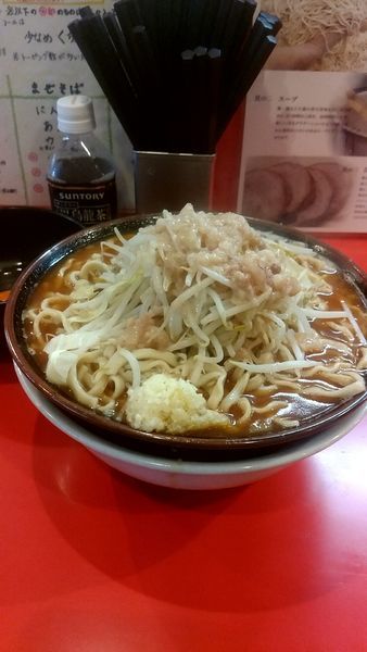 「辛いラーメン(400g)・生卵」@麺屋 桐龍の写真