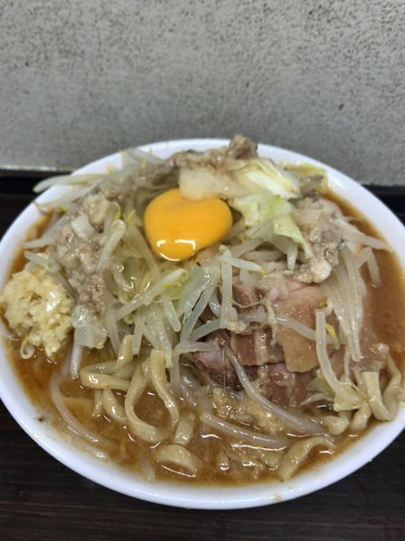 「86辛味噌ラーメン¥950豚2枚¥200生卵¥50」@らーめん虎丸の写真