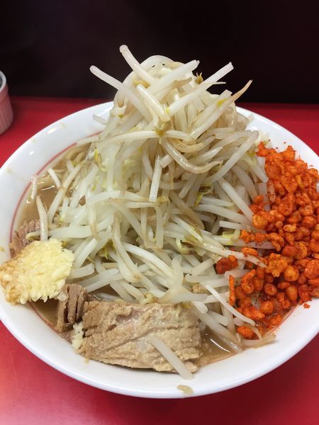 「ラーメン脂少なめニンニク辛揚げ」@千里眼の写真