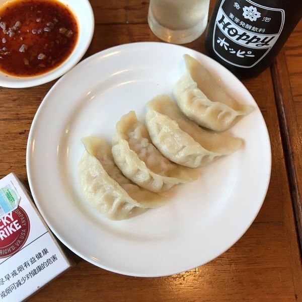 「豚肉・漬け白菜のジャンボ蒸し餃子 540円」@東北人家の写真