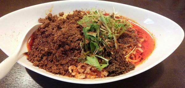 「つゆ無し担々麺両方6辛」@四川担担麺 阿吽 湯島店の写真