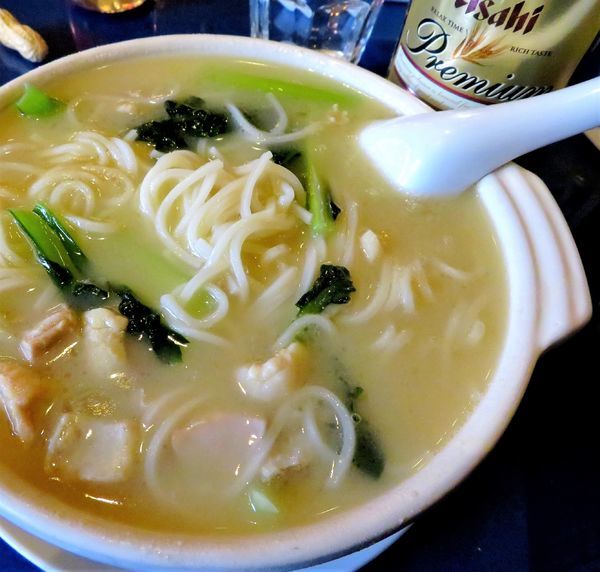「爛鶏煨麺（1,200円）＋アサヒ熟選」@八重洲大飯店の写真