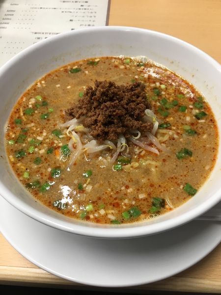 「山椒かおるスパイシィ担々麺白」@中華食堂 熊谷の写真