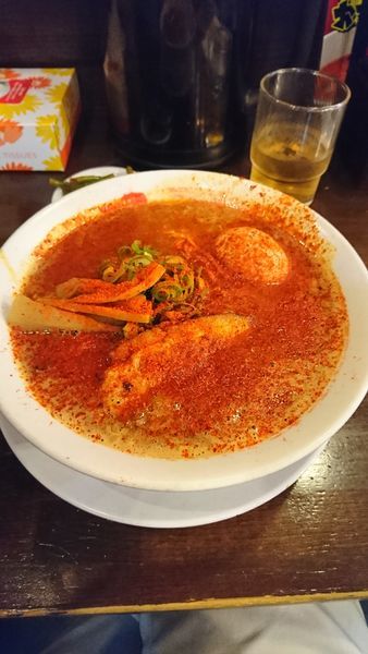 「濃辛 味たまトッピング」@ばり嗎 狭山ヶ丘店の写真