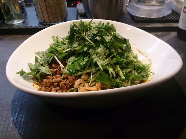 「汁なし担々麺(辛中 痺中)+パクチー」@タンタンタイガー 中野店の写真