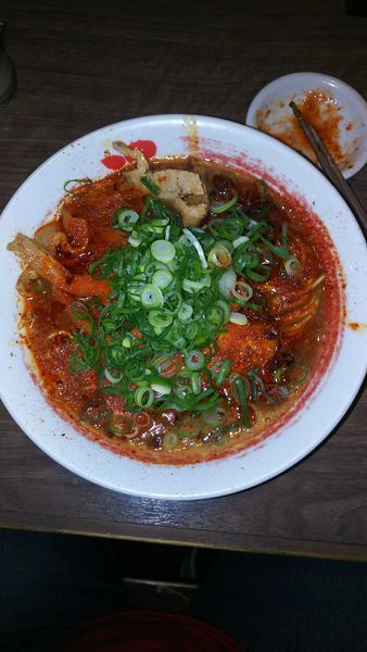 「極辛（大辛）ネギトッピング」@ばり嗎 狭山ヶ丘店の写真