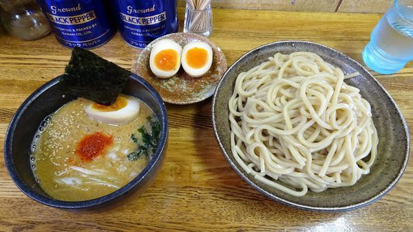 「胡麻つけめん：大（850円）＋半熟味玉（100円）」@一陽来福の写真